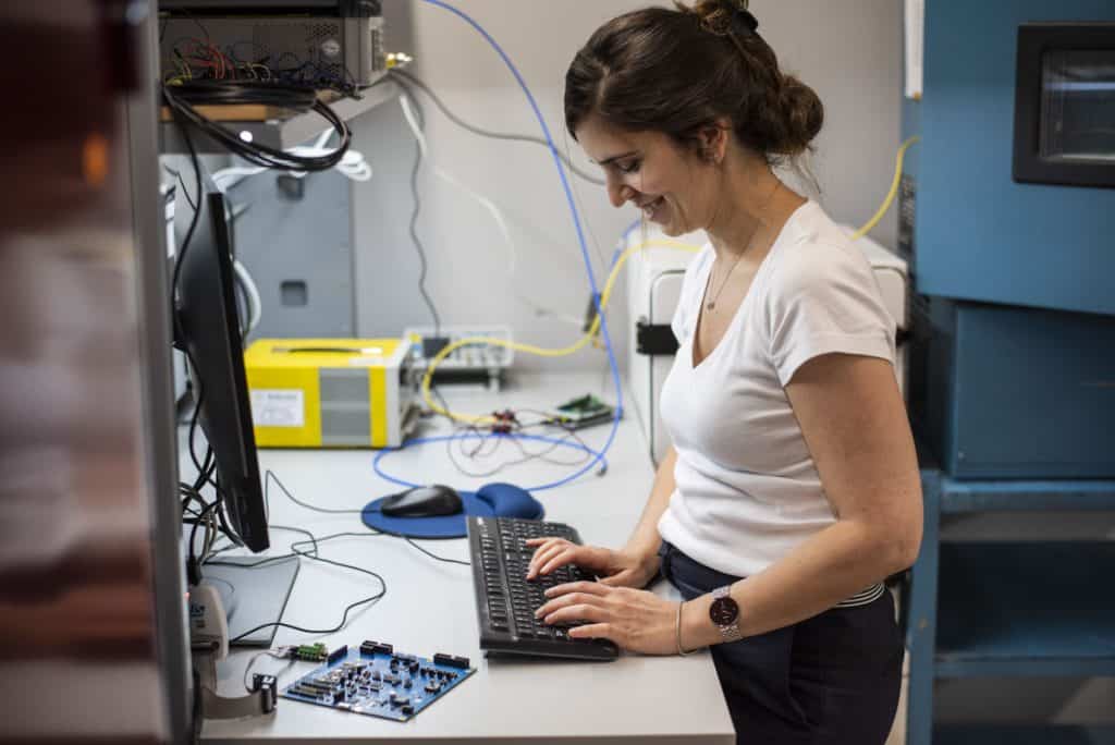 Woman working on computer at CoreTigo