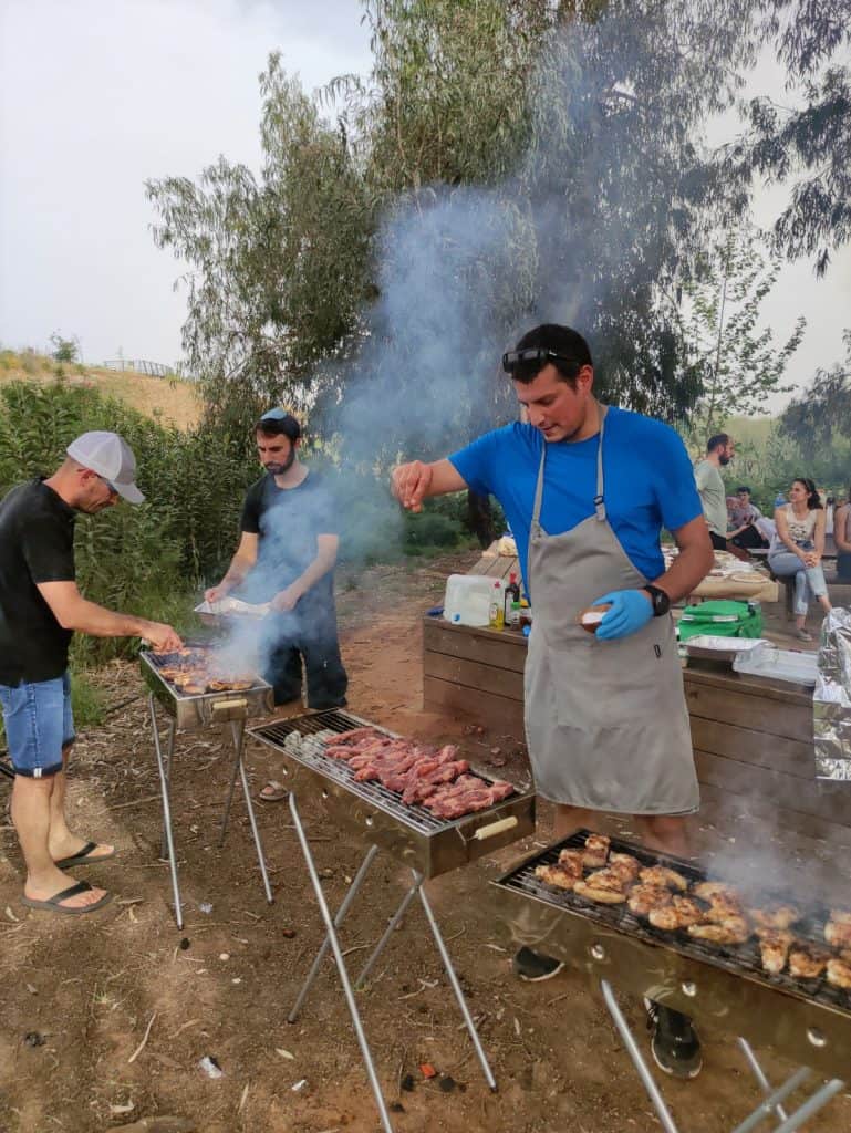 CoreTigo employees barbecue at a company event